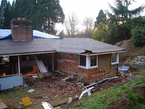 IMGP1091.JPG - Roofing and siding removed.  What a mess.   Siding will be reused.