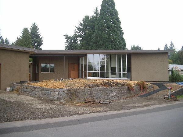 IMGP1725.JPG - No more ranch!  Exterior glazing of the passive solar heat space is complete.